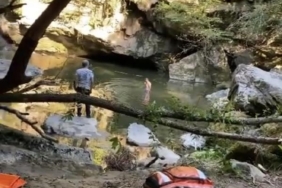 Bartında kayalıktan şelale göletine atlayınca 10 metre derinlikteki çamura saplandı