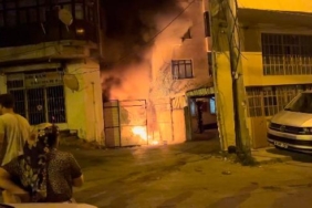 Bursada evin bahçesinde çıkan yangın iş yerine sıçradı 3 kişi dumandan etkilendi