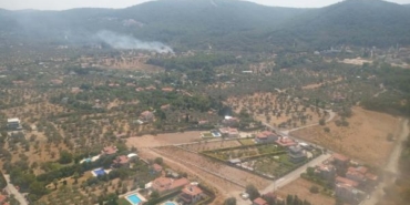 İzmir'de çıkan orman yangını, yarım saatte kontrol altına alındı 5 İzmirde çıkan orman yangını yarım saatte kontrol altına alındı