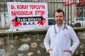 Tartıştıkları doktordan pankartla özür dilediler